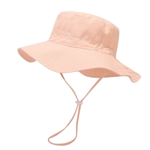 Close-up of pink breathable cotton kids bucket hat with adjustable windproof drawstring
