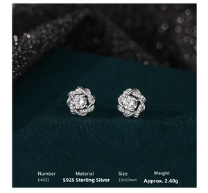Macro shot of S925 sterling silver flower earrings with round-cut center zircon