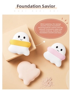 Detail of cute ghost-shaped makeup sponges in yellow and pink with soft texture