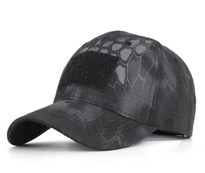 Detail of ripstop camouflage fabric and front hook-and-loop patch area on tactical cap