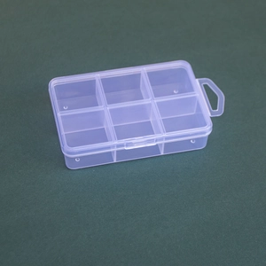 Detail view of a 6-compartment transparent PP plastic storage box with a side hanging hole
