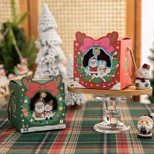 Christmas gift boxes with Santa designs, antler closure, and golden rope handles