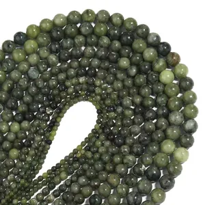 Natural Russian serpentine gemstone beads in varied sizes arranged in a spiral pattern