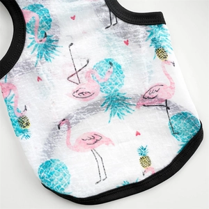 Detail of breathable summer pet vest with pink flamingo and blue pineapple prints