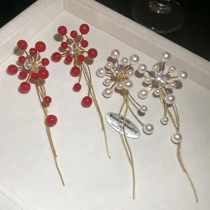 Elegant floral starburst stud earrings with zircon and long tassel fringe pendants