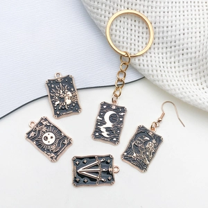 Vintage gothic tarot charms collection with black enamel and gold plating for jewelry