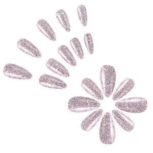 Flat lay of pink glitter teardrop-shaped press-on nails arranged in a floral pattern