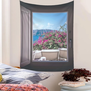 Detail of wall tapestry featuring a coastal window view with vibrant pink bougainvillea