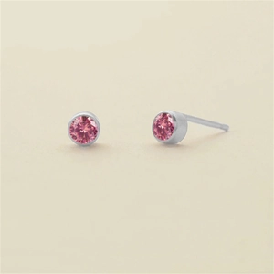 Minimalist round pink zircon stud earrings with silver finish in bezel setting
