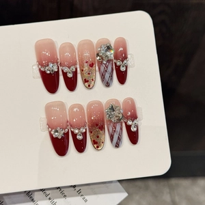 Velvet burgundy heart gradient press-on nails with rhinestones in long almond shape