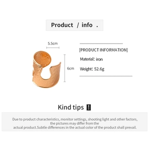 Detail view of hammered texture rose gold wide cuff bracelet with iron material dimensions