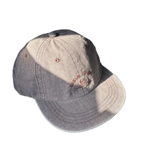 Washed dark gray canvas hip-hop baseball cap with orange Dream Big embroidery