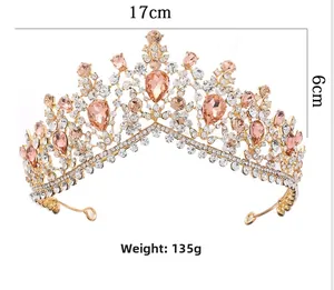 Luxurious gold crystal bridal tiara with champagne teardrop stones, 17cm wide and 6cm high