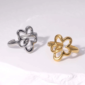 Minimalist stainless steel open flower rings in gold and silver finish for women