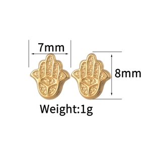 Detailed view of golden Hamsa Hand stud earrings with 7mm by 8mm dimensions and 1g weight
