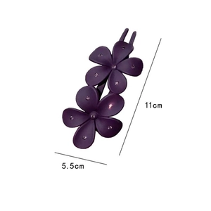 Detailed size display of a dark purple acrylic floral hair claw with purple rhinestones
