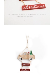 Close-up of a rustic wooden Christmas truck ornament with Merry Christmas sign