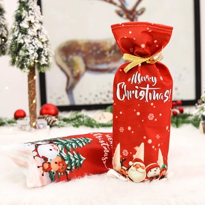 Christmas wine bottle cover with cartoon Santa and reindeer on white faux fur rug