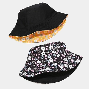 Reversible bucket hat with floral pattern and solid black side for sun protection