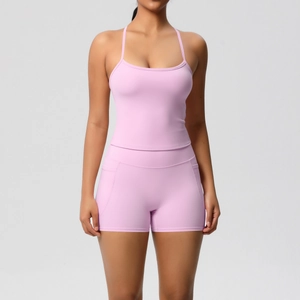 Detail of lavender high-stretch yoga set featuring racerback tank top and biker shorts