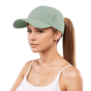 Detail of laser-cut ventilation holes on lightweight quick-dry ponytail baseball cap