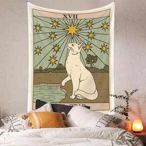 Detail of bohemian cat tarot tapestry XVII The Star hanging in cozy bedroom interior