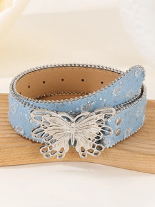 Detail showing blue denim belt with butterfly buckle and silver sequin decorations