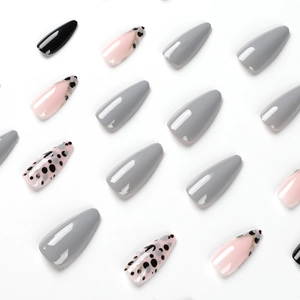 Glossy long coffin press-on nails with grey, pink, polka dots, and gold line accents