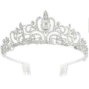 Detail of silver bridal crown with intricate rhinestones and side metal combs
