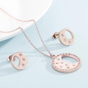Parure bijoux étoile lune or rose avec collier et boucles d'oreilles sertis de strass