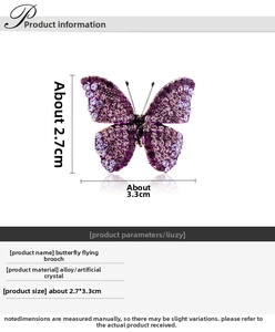 Detailed view of elegant butterfly brooch with purple crystals and 2.7x3.3cm dimensions