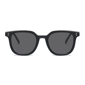 Classic square black sunglasses with dark grey lenses in a minimalist fashion style