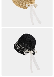 Detail of crochet bucket hat featuring delicate white lace ribbons and striped knit patterns