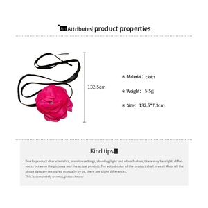 Detail view of pink cloth flower choker with black satin ribbon and size specifications