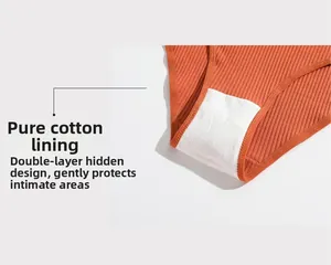 Detail of orange ribbed cotton panties showing double-layer crotch lining design