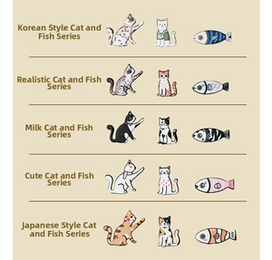 Detail view of five sets of cartoon cat and fish enamel pins in various artistic styles