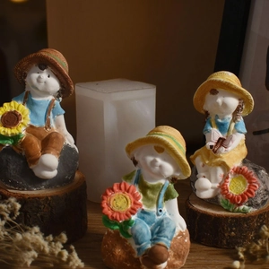 Three DIY silicone sunflower boy doll molds for making aromatherapy candles and gypsum crafts