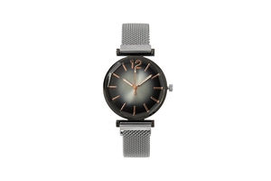 Detailed close-up of a ladies' quartz watch with gradient dial and mesh magnetic strap