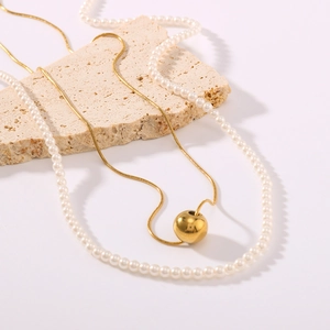 Minimalist 18K gold-plated double-layer necklace with gold ball pendant and white pearls