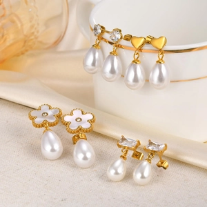 Golden stainless steel drop earrings with heart and pearl motifs for women