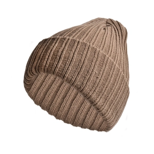 Close-up of the brown ribbed knit texture on a warm unisex winter beanie hat