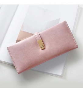 Detailed close-up of a pink matte PU leather long wallet with a golden metal buckle closure