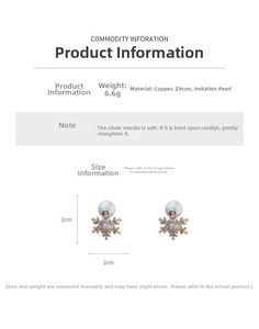 Detail view of snowflake earrings with zircon stones and white pearls including size scale