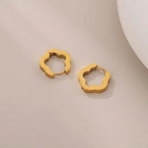 Polished gold flower hoop earrings made of stainless steel with minimalist petal design