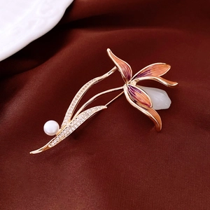 Detailed orchid brooch with purple enamel petals, sparkling crystals and white pearl