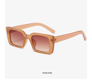 Detailed 45-degree side view of vintage square sunglasses with amber frames