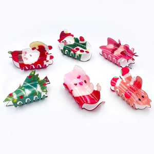 Cute Christmas acrylic hair claws featuring Santa, reindeer, and gingerbread man set