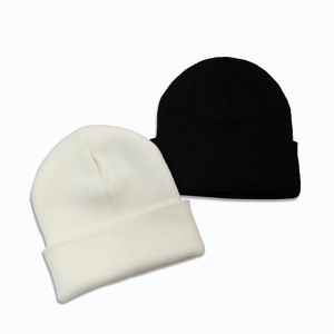 Winterstrickmützen in Schwarz und Weiß mit dickem Umschlagdesign für kaltes Wetter