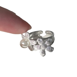 Elegant floral pearl ring in silver finish with adjustable open band for women