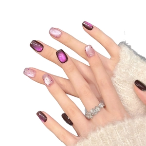Elegant purple cat eye and pink glitter press-on nails with shiny gradient texture